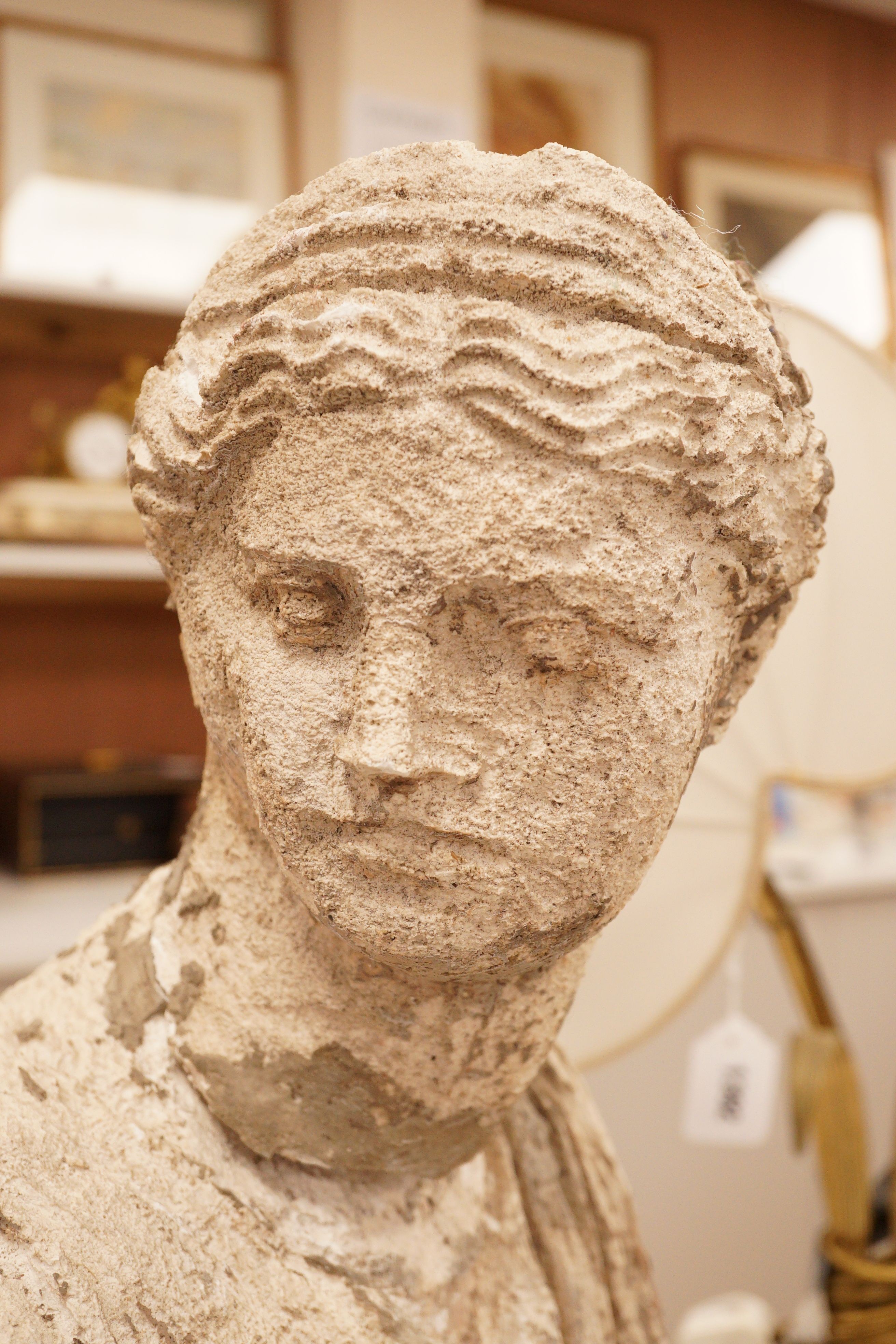 A reconstituted bust of a classical figure, 54cm tall